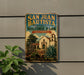 A vintage-style metal sign for San Juan Bautista State Historic Park in California, featuring an illustration of a historic building and a palm tree.