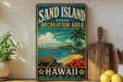 A vintage-style sign for the "Sand Island State Recreation Area" in Hawaii, featuring a beach scene with a turtle, palm trees, and a city skyline in the background.