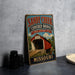 A vintage-style metal sign for the Sandy Creek Covered Bridge in Missouri, featuring an illustration of a covered bridge and the text "Sandy Creek Covered Bridge Missouri".