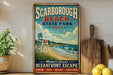 A vintage-style sign for Scarboro Beach, Maine, featuring a lifeguard chair and a beach scene with waves.