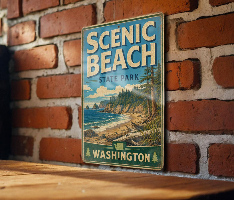A vintage-style metal sign for Scenic Beach State Park in Washington, featuring a scenic illustration of the park's landscape.