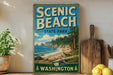 A vintage-style sign for Scenic Beach State Park in Washington, featuring a scenic landscape with a beach, mountains, and pine trees.