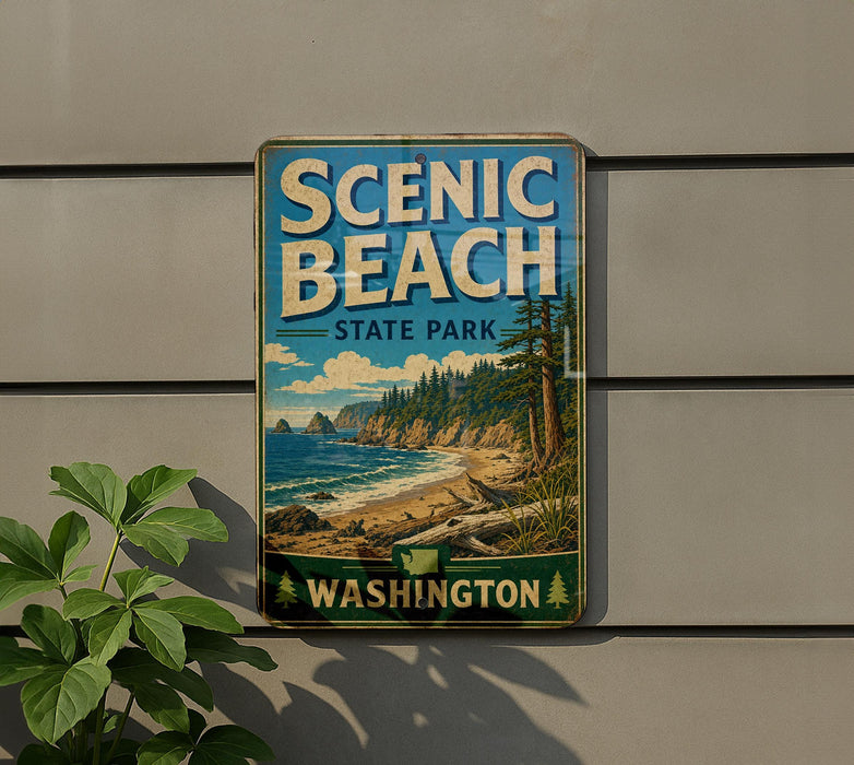 A vintage-style metal sign for Scenic Beach State Park in Washington, featuring a scenic landscape with a beach, mountains, and pine trees.