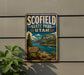 A vintage-style metal sign for Scofield State Park in Utah, featuring a scenic mountain landscape with a lake and a boat.