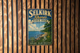 A vintage metal sign for Selkirk Shores State Park in New York, featuring a scenic illustration of the park's shoreline and surrounding landscape.