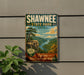 A vintage-style metal sign for Shawnee State Park, Ohio, featuring a scenic landscape with a river, mountains, and a pine tree.