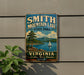 A vintage-style metal sign for Smith Mountain Lake State Park in Virginia, featuring a scenic landscape with a sailboat on the lake.
