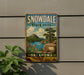A vintage-style sign for Snowdale State Park in Oklahoma, featuring a scenic landscape with a lake, mountains, and a tree.