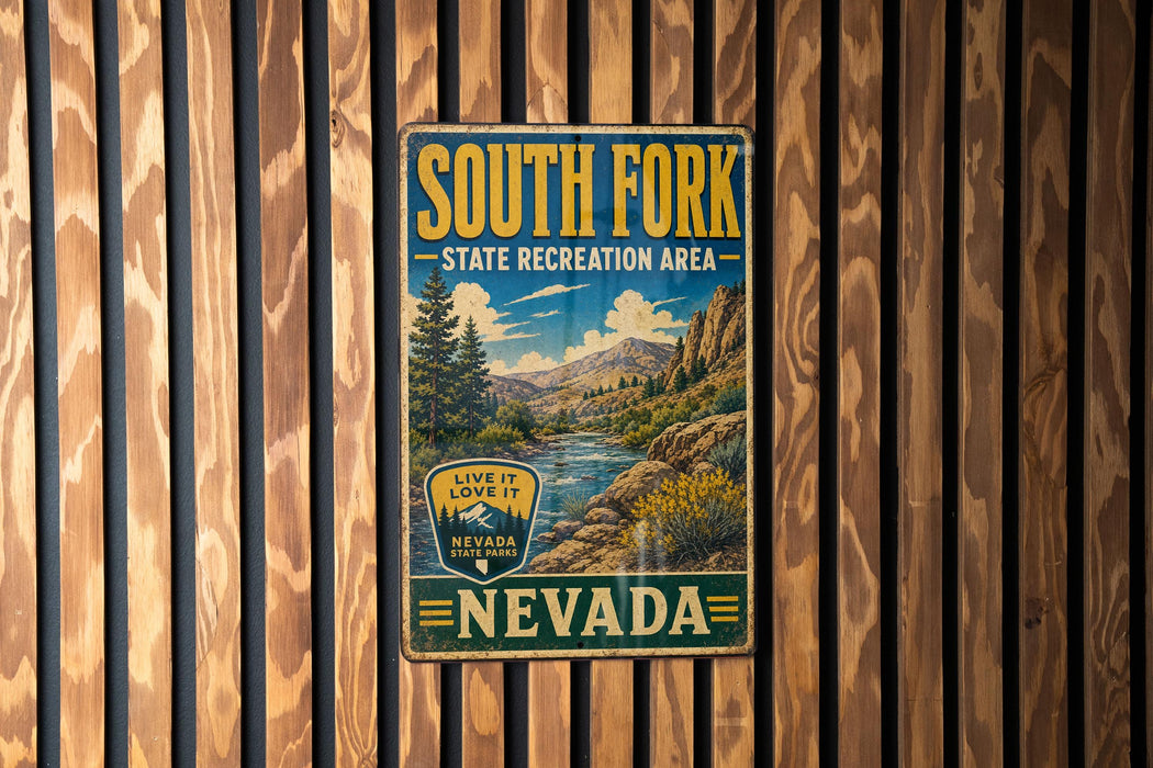 A vintage metal sign for South Fork State Recreation Area in Nevada, featuring a scenic landscape with mountains, trees, and a river.