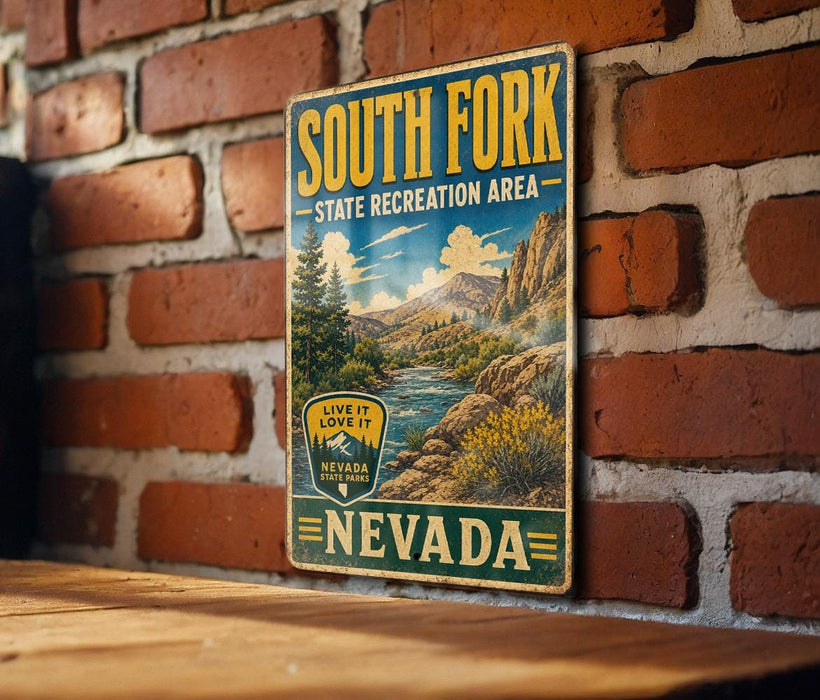 A vintage-style sign for the South Fork State Recreation Area in Nevada, featuring a scenic mountain landscape and a river.