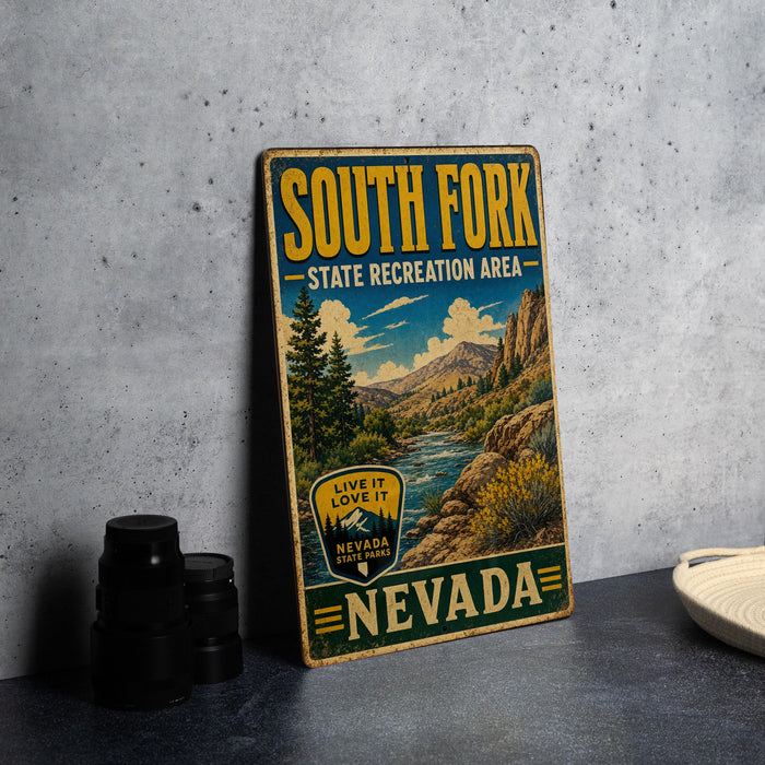 A vintage-style sign for South Fork State Recreation Area in Nevada, featuring a scenic mountain landscape and a river.