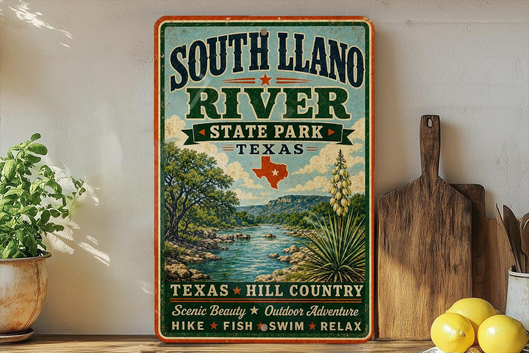 A vintage-style sign for South Llano River State Park in Texas, featuring a scenic illustration of the river surrounded by lush greenery and a desert landscape.