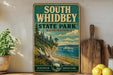 a vintage-style sign for South Whidbey State Park in Washington, with a scenic illustration of a coastal landscape and a boat on the water.