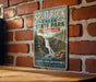 A vintage-style metal sign for Split Rock Creek State Park in Minnesota, featuring a waterfall and forest scenery.