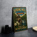 A vintage-style metal sign for Spring Mill State Park, Indiana, featuring an illustration of a mill and a waterfall.