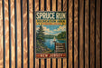 A vintage-style metal sign for the SPRUCE RUN Recreation Area in New Jersey, featuring a scenic image of a lake and pine trees.
