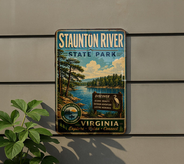 a vintage-style metal sign for Staunton River State Park, with a scenic illustration of a river, trees, and a bird.