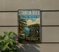 a vintage-style metal sign for Staunton River State Park, with a scenic illustration of a river, trees, and a bird.