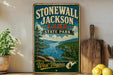 A vintage-style sign for Stonewall Jackson Lake State Park in West Virginia, featuring a scenic illustration of the lake surrounded by mountains and forests.