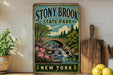 A vintage-style sign for Stony Brook State Park in New York, featuring a scenic illustration of a bridge over a waterfall surrounded by trees and flowers.