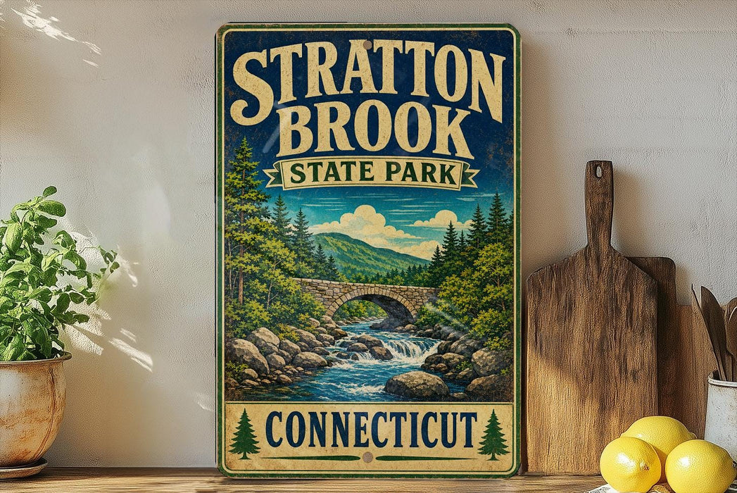 A vintage-style sign for Stratton Brook State Park in Connecticut, featuring a scenic illustration of a river, bridge, and forest.