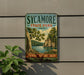 A vintage-style sign for Sycamore State Park in Ohio, featuring a scenic landscape with a lake, trees, and mountains.