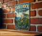 A vintage-style metal sign for Table Rock State Park in South Carolina, featuring a scenic mountain landscape.
