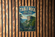 A vintage-style metal sign for Table Rock State Park in South Carolina, featuring a scenic image of the park's landscape.