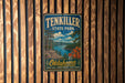 A vintage-style metal sign for Ten Killer State Park in Oklahoma, featuring a scenic landscape with a lake, mountains, and autumn foliage.