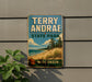 A vintage-style sign for Terry Andrae State Park in Wisconsin, featuring a scenic beach landscape with pine trees and a lake.