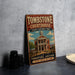 A vintage-style sign for Tombstone Courthouse, a historic park in Arizona, with a building illustration and the text "Tombstone Courthouse State Historic Park" on it.