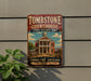 A vintage-style metal sign for Tombstone Courthouse State Historic Park in Arizona, featuring an illustration of the historic building and the text "Tombstone Courthouse State Historic Park" and "Tombstone, Arizona Step back in time".
