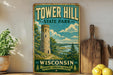 A vintage-style sign for Tower Hill State Park in Wisconsin, featuring a tower and a scenic landscape.