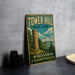 A vintage-style sign for Tower Hill State Park in Wisconsin, featuring a tower and a scenic landscape.