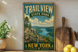 A vintage-style sign for Trail View State Park in New York, featuring a scenic landscape with a river and mountains in the background.