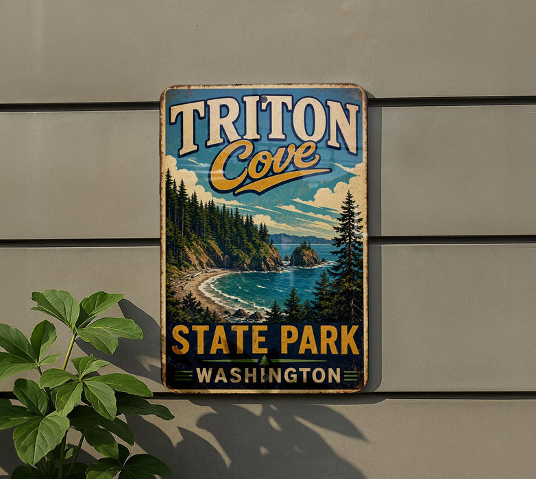 A vintage metal sign for Triton Cove State Park in Washington, featuring a scenic landscape with a beach, mountains, and pine trees.