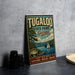 A vintage-style metal sign for Tugaloo State Park in Georgia, featuring a scenic landscape with a lake, mountains, and a sailboat.