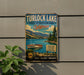 A vintage metal sign for Turlock Lake, California, featuring a scenic illustration of the lake and surrounding landscape.