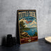 A vintage-style metal sign for Tuttle Creek State Park in Kansas, featuring a scenic landscape with a lake, trees, and a sailboat.
