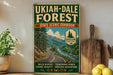 a vintage-style sign for the UKIAH-DALE FOREST, a scenic corridor in Oregon, with a winding road and lush greenery. The sign is displayed on a wooden shelf, surrounded by various kitchen utensils and a potted plant.