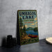 A vintage-style sign for Umbagog Lake, New Hampshire, featuring a scenic illustration of the lake and surrounding landscape.