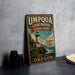 A vintage-style metal sign for Umpqua Lighthouse State Park, featuring a lighthouse and a scenic coastal landscape.