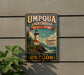 A vintage-style metal sign for Umpqua Lighthouse State Park, featuring a lighthouse and a scenic coastal landscape.