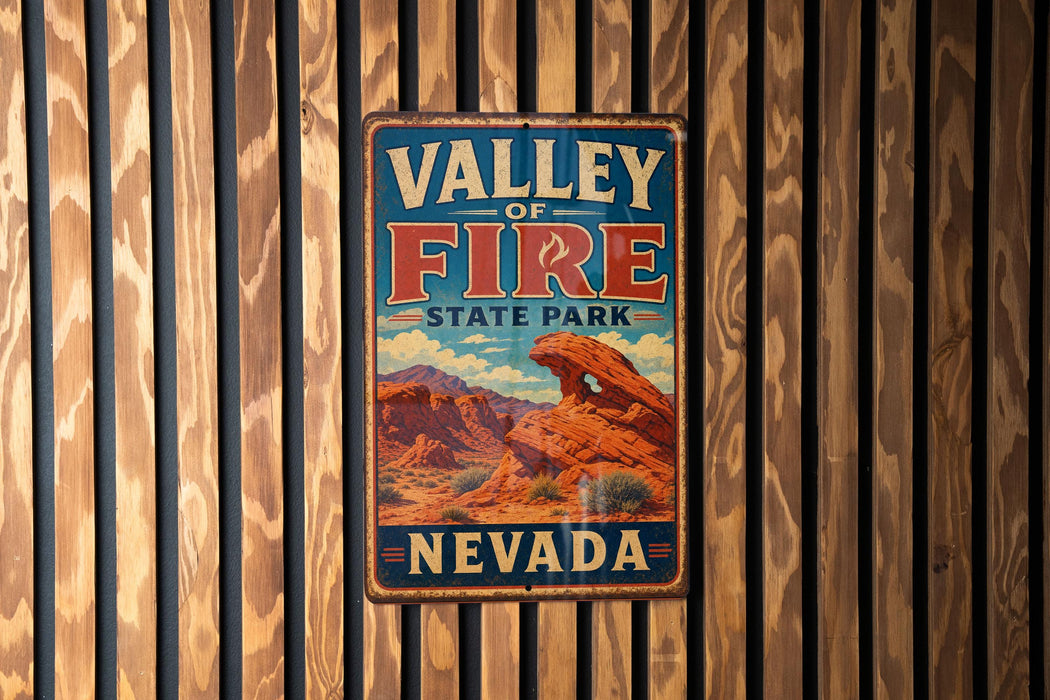 A vintage metal sign for Valley of Fire State Park in Nevada, featuring an illustration of the park's iconic rock formations.