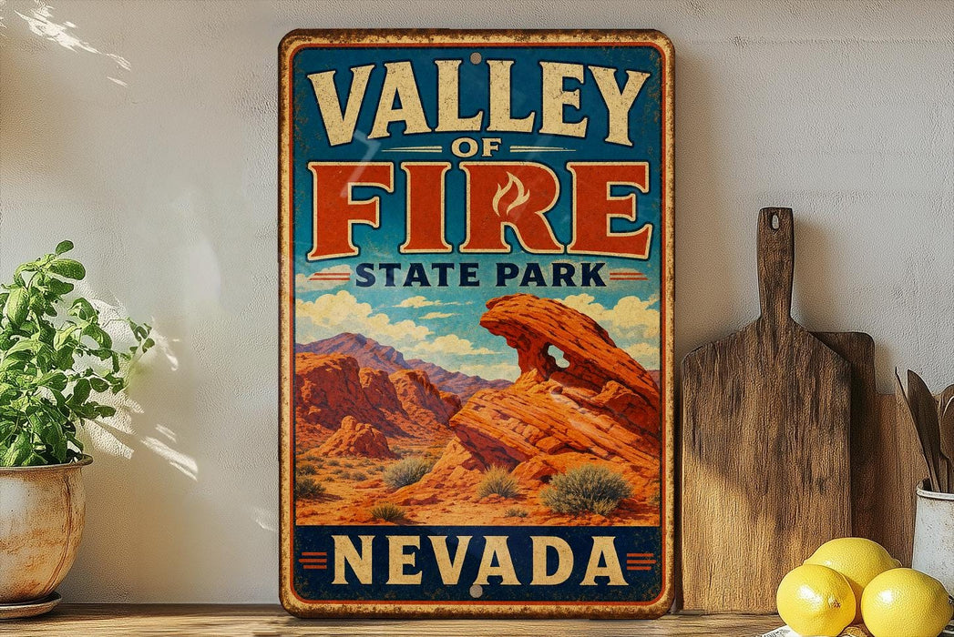 A vintage-style metal sign for Valley of Fire State Park in Nevada, featuring a desert landscape with mountains and a prominent rock formation.
