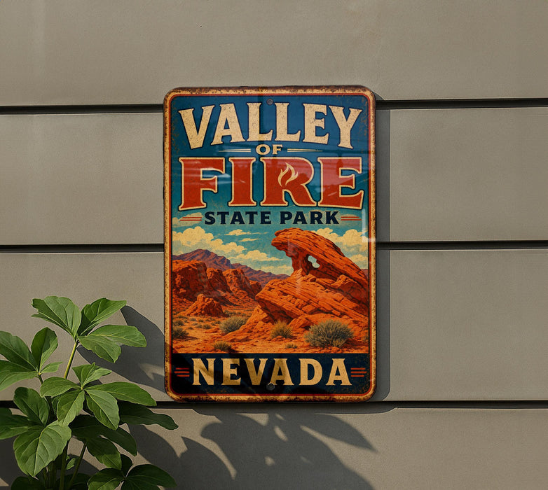 A vintage-style metal sign for Valley of Fire State Park in Nevada, featuring a desert landscape with mountains and a prominent rock formation.