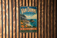 A vintage-style metal sign for Van Damme State Park in California, featuring a scenic coastal landscape with a beach, mountains, and a waterfall.