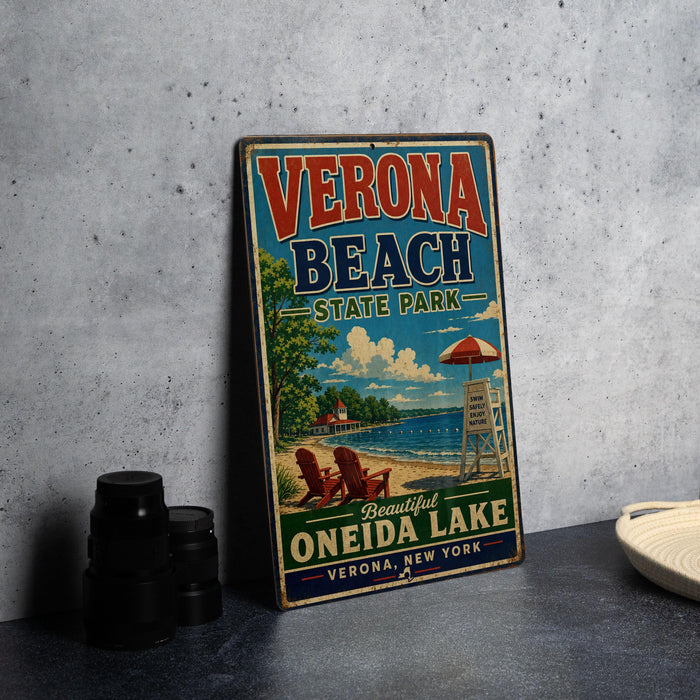 A vintage-style sign for Verona Beach State Park, featuring a beach scene with a lifeguard tower and chairs, along with the text "Verona Beach State Park - Beautiful Lake Oneida Lake - Verona, New York".