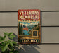 A vintage metal sign for the Veterans Memorial State Park in Idaho, featuring an American flag and a scenic landscape.