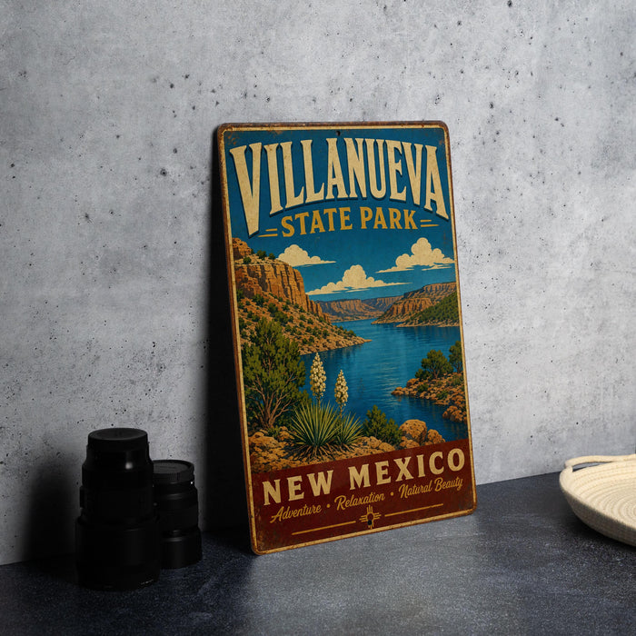 A vintage-style sign for Villanueva State Park in New Mexico, featuring a scenic landscape with mountains, a lake, and desert vegetation.